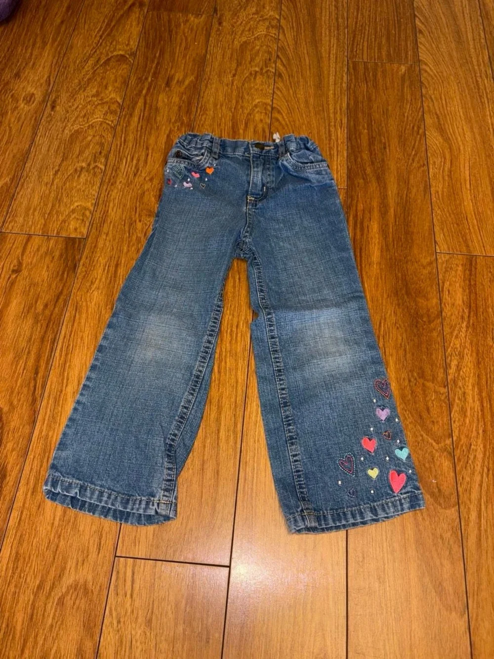Y2K denim jeans with embroidered hearts